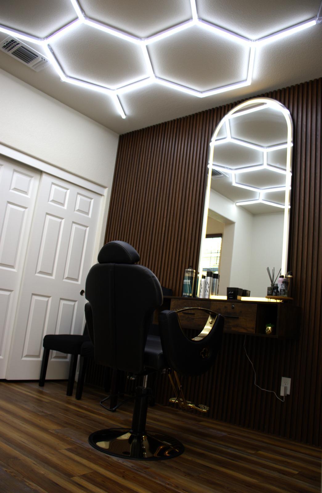 Cali Beauty Loft — dramatic hexagonal LED ceiling and salon chair