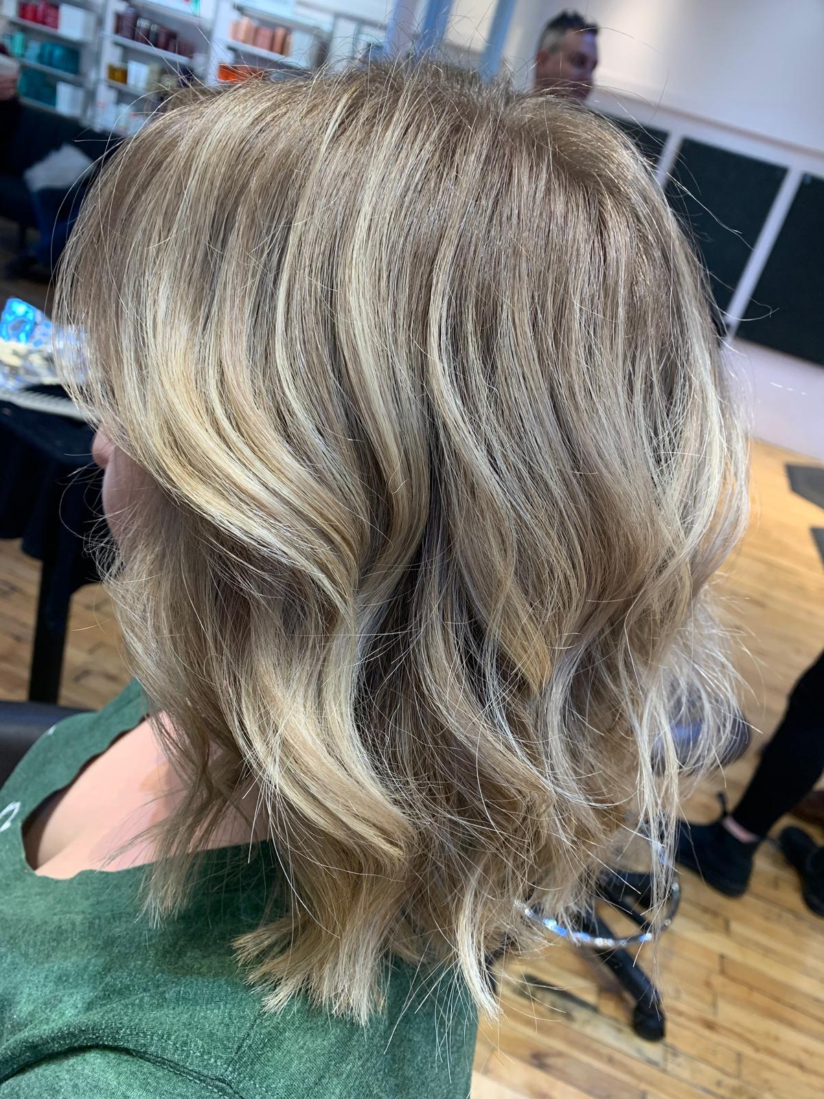 Blonde medium-length styled waves