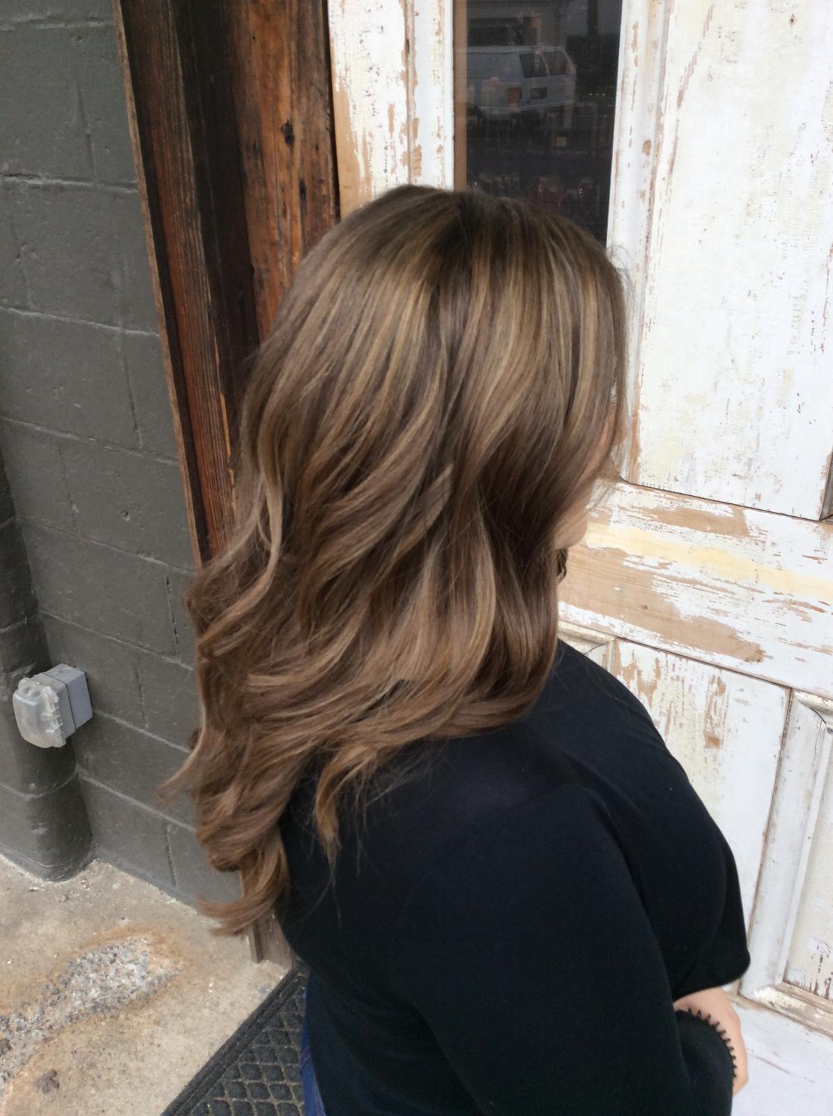 Brunette balayage with warm highlights