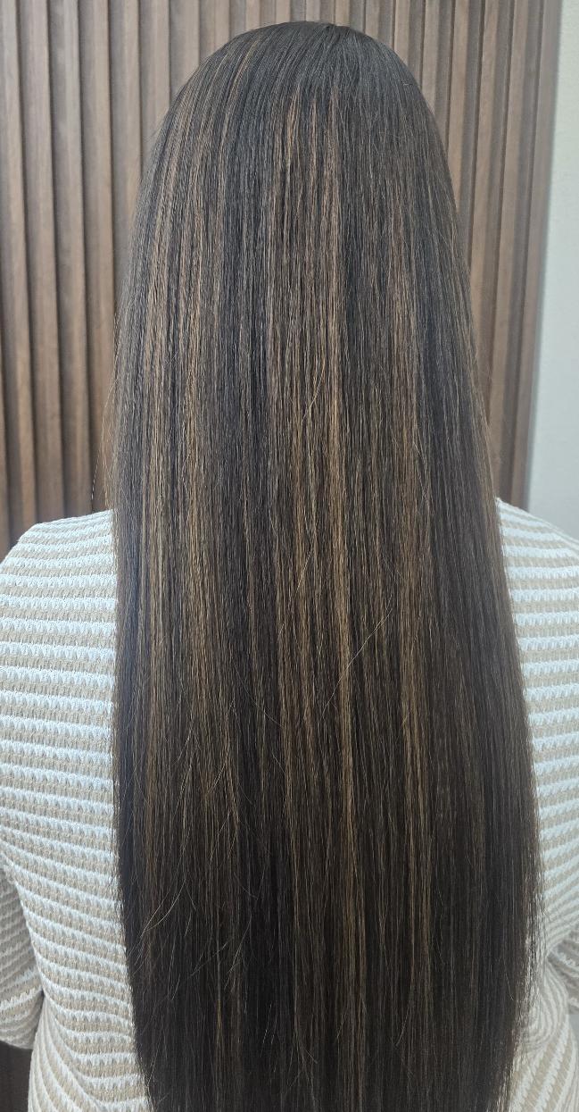 Sleek straight dark hair — smoothing treatment result